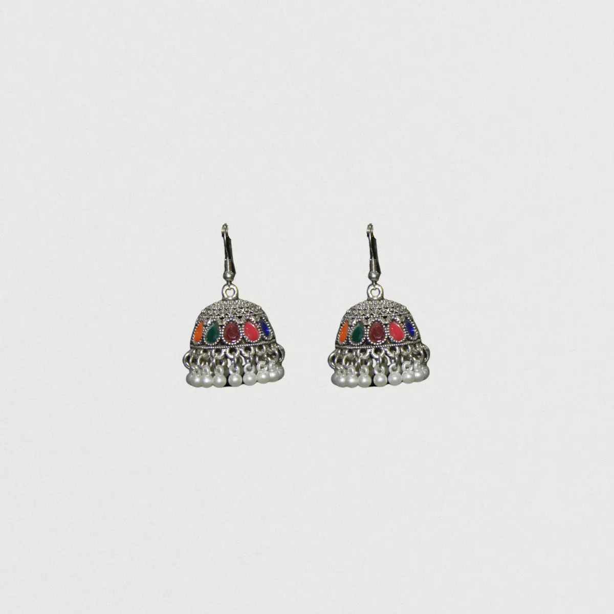 Multi-gem jhumka bell earrings with colorful stones and pearl drops, traditional Indian handcrafted jewelry design