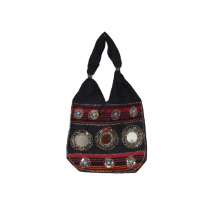 Black and red hobo bag with tribal embroidery creating dramatic color contrast