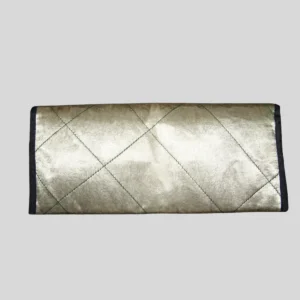 Champagne gold quilted silk clutch with diamond pattern stitching for formal events