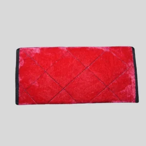 Red velvet quilted clutch with diamond stitching pattern for formal occasions and weddings