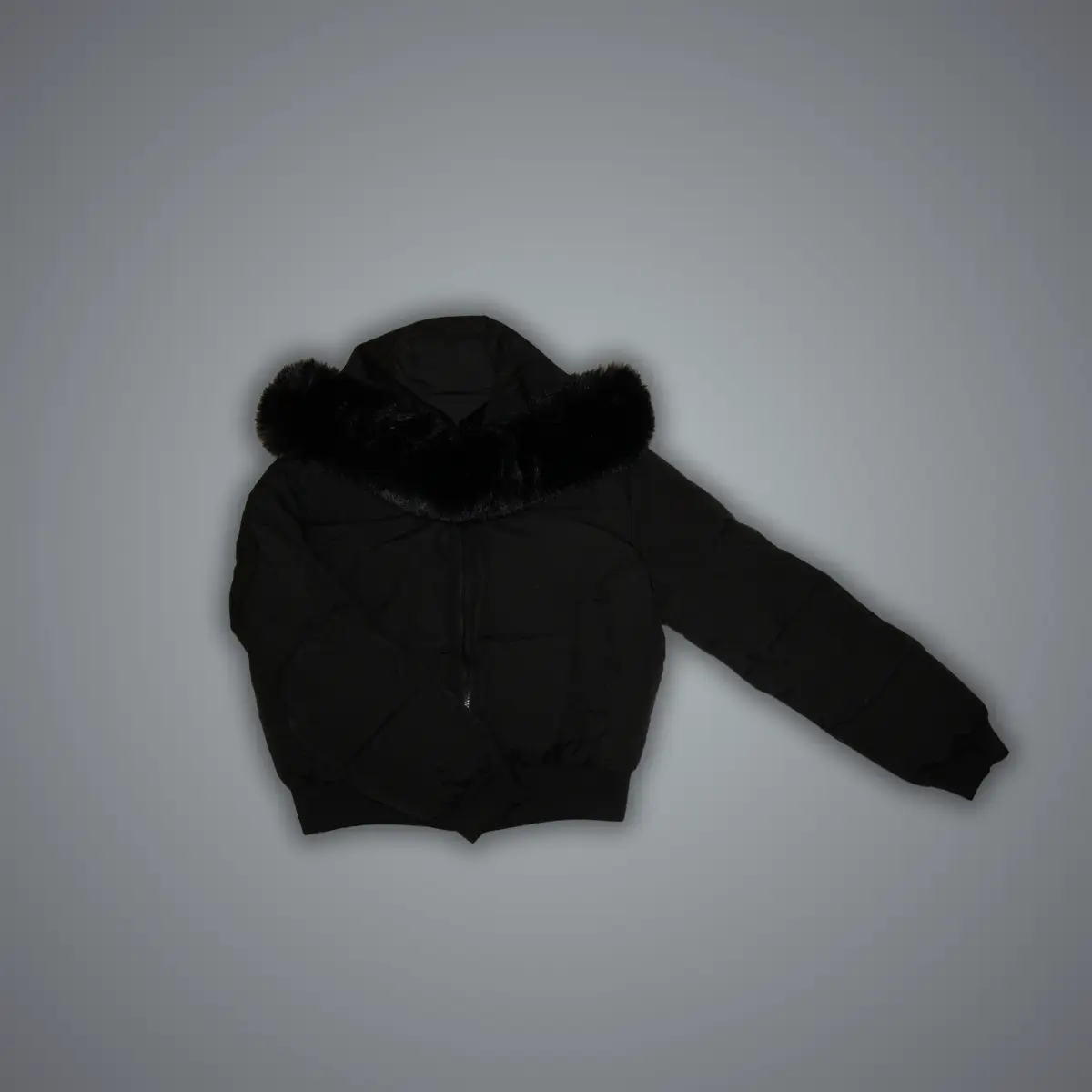 Black cropped puffer jacket with diamond quilting, fitted silhouette, waist-length on model, matte finish