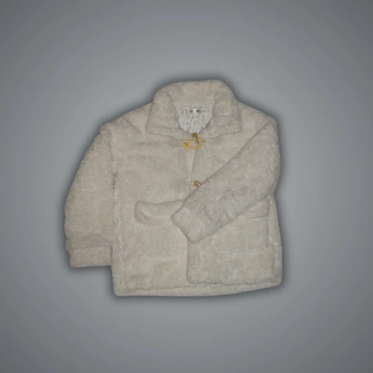 White fluffy sherpa teddy coat with deep pockets on model, front view showing soft pile texture