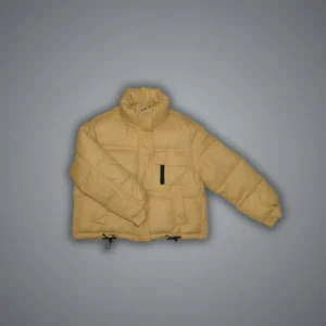 Bright yellow quilted puffer jacket on model, cropped length hitting natural waist, diamond stitch pattern